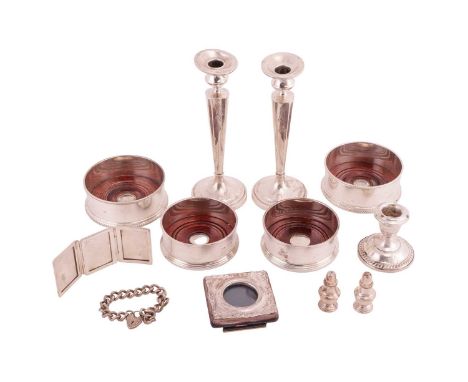 A collection of miscellaneous items; to include examples of a silver locket bracelet, a silver mounted photo frame, two pairs