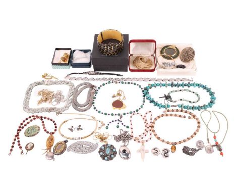 A mixed collection of costume jewellery including gold-plated bangle, a spray brooch by Monet, a pair of ear clips by Trifari