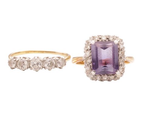 Two diamond-set dress rings; the first containing a canted step-cut amethyst, claw-set within a frame of single-cut diamonds,