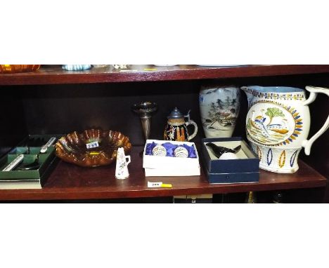 A good mixed lot of ceramics to include a 19th century jug with relief decoration depicting peacocks, a Portmeirion salad ser