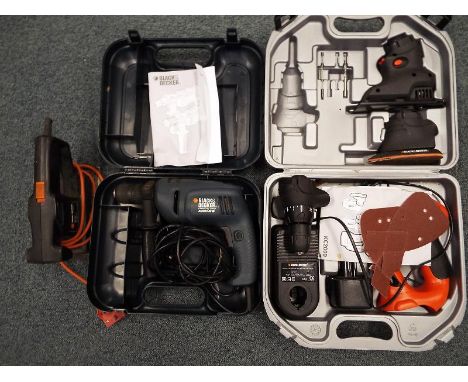 A collection of tools to include a Black and Decker Quatro, cased, a Black and Decker electric drill Model No. KR600CRE and a