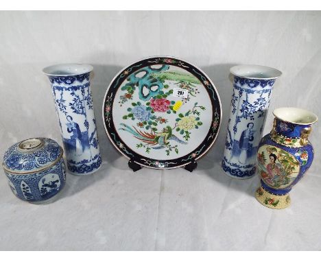 A collection of Asian ceramics to include a pair of blue and white vases, four panel maker's mark to the base, a lidded blue 