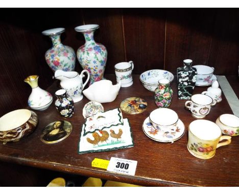 A collection of miniature ceramics to include Royal Worcester, Winton, Coalport, Spode, Wemys and other