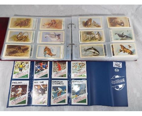 An album of Grandee cigarette cards to include Top Dogs, Wildlife and similar, predominantly complete, include in the lot is 