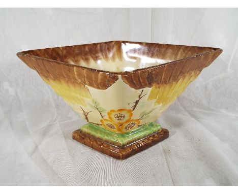 An Art Deco planter by Myott decorated in a floral [pattern 15cm x 27.5 cm Est £30 - £50