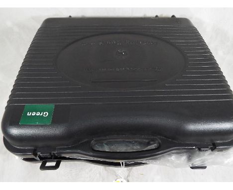 A portable gas stove with plastic moulded carry cases and manual, unused