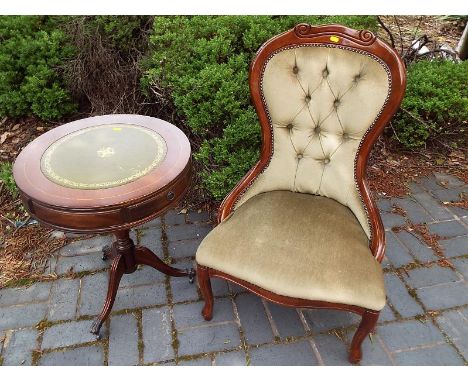 A button back low chair and a drum table on tripod support - (2)