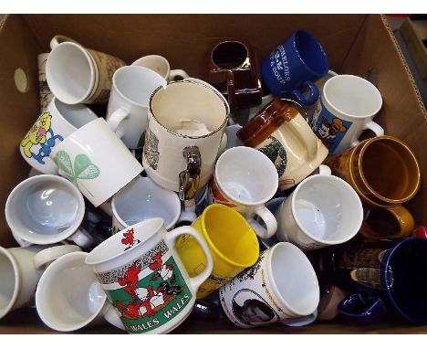 A large collection of ceramic mugs to include promotional, commemorative, tourism and similar
