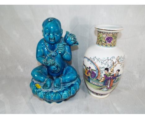 A ceramic Lucky Buddha with a salt glaze finish, 29cm (h) and a Chinese vase depicting ladies. seven panel makers stamp to th