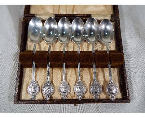 A George V cased set of six silver hallmarked teaspoons, London assay 1934, each finial depicting the jubilee busts - Est £30