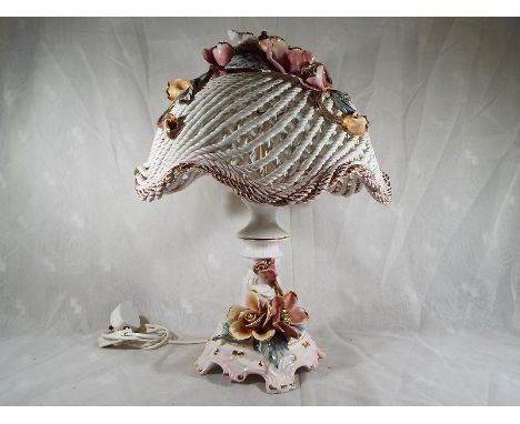 A Capodimonte table lamp decorated in a floral design, 48cm