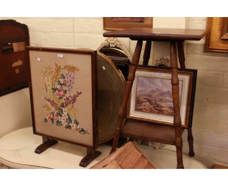 Oak occasional table, circular brass topped folding coffee table, two door wall cabinet, firescreen and pair of prints (6)