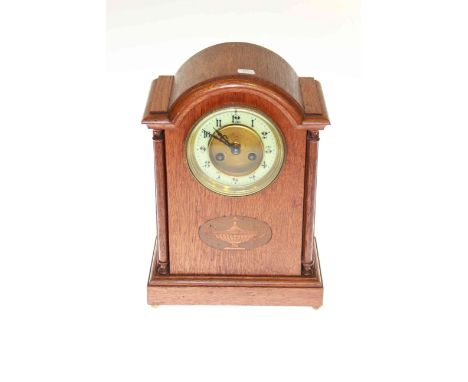 Oak arched top mantel clock with enamelled dial