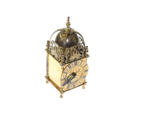 Period style mantel clock in the form of a lantern clock