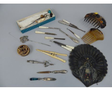 Miscellaneous items, to include hat pins, a simulated tortoiseshell comb, a studs box, some manicure related items etc.