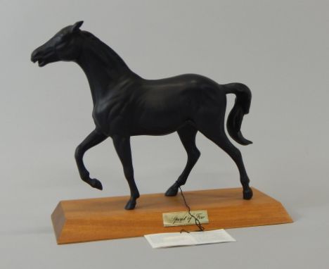 A John Beswick ceramic figure Spirit of Fire, on a hardwood base with original label etc., 23.5cm high