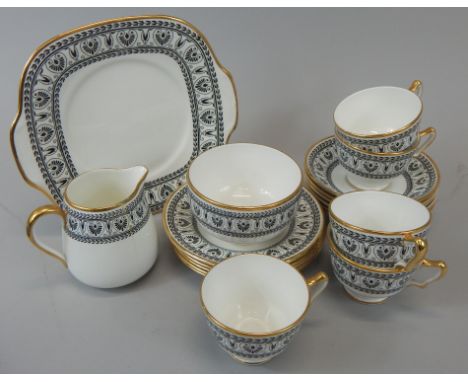 A Crown Staffordshire black Victoria pattern part tea set