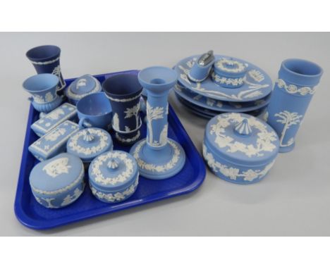 Various items of Wedgwood blue Jasperware, to include candlestick, cylindrical vase, urns, plates, boxes and covers etc.