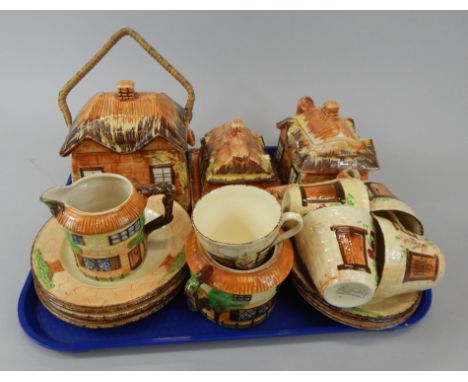 A quantity of Cottage ware, to include a biscuit barrel and cover, butter dish, teapot, and a Burlington part tea set.