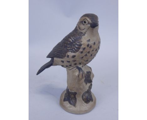 A Poole pottery model of a thrush, by B. Linley Adams.