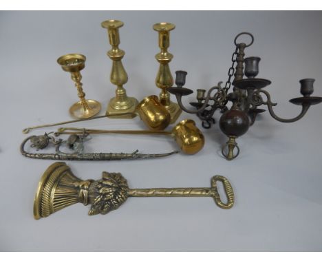 Various items of metalware, to include a brass five branch chandelier, a door stop, two Middle Eastern pipes, a pair of candl