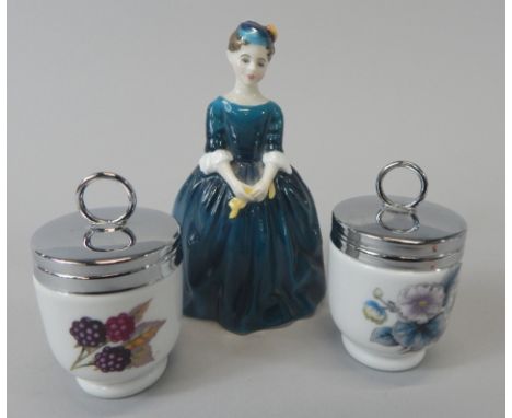 A Royal Doulton porcelain figure of Cherie, HN2341 and a pair of Royal Worcester egg coddlers
