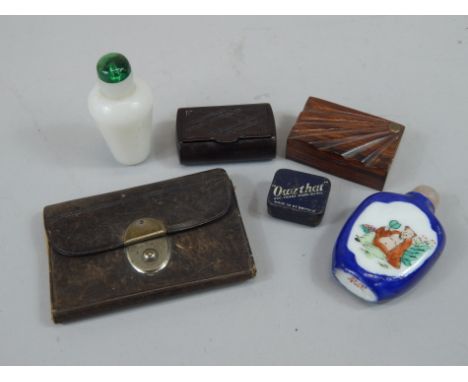 A collection of snuff related items etc., to include two Oriental snuff boxes, a Bakelite snuff box, a bone part manicure set