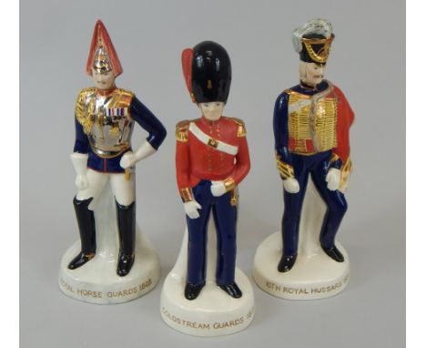Three Carltonware ceramic figures, each modelled in the form of a soldier, from the 10th Royal Hussars in 1831, the Royal Hor