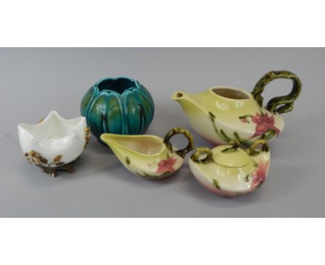 A collection of ceramics, to include an American three piece tea set, stamped to the base, Hull, W26, USA, and a globular vas