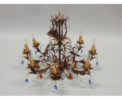 A modern painted chandelier, suspended with coloured drops, 72cm wide.