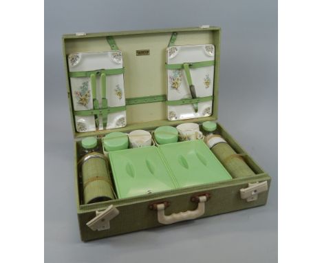 A Brexton picnic hamper, with fitted interior, to include rectangular plates, etc.