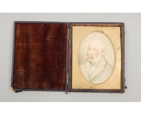 Early 19thC School.  Portrait miniature with gentleman, watercolour, oval, image size 9cm x 6.5cm, in leather case