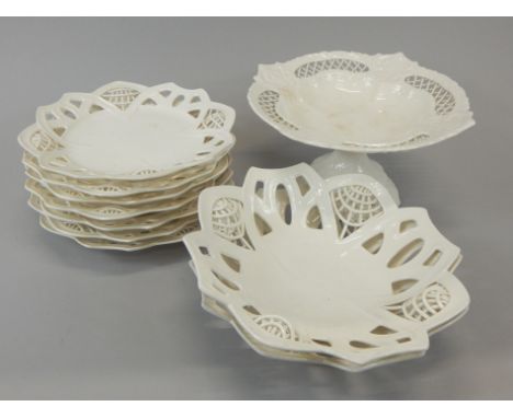 A Continental cream ware type part dessert service, to include two bowls and various plates, and a similar comport.