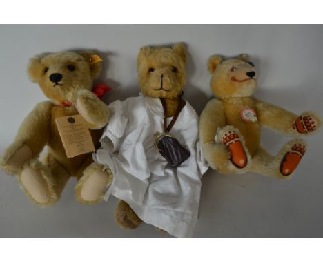 THREE TEDDY BEARS, one unboxed replica 1909 original Steiff teddy bear, Steiff label to left ear, approximate height 38cm, on