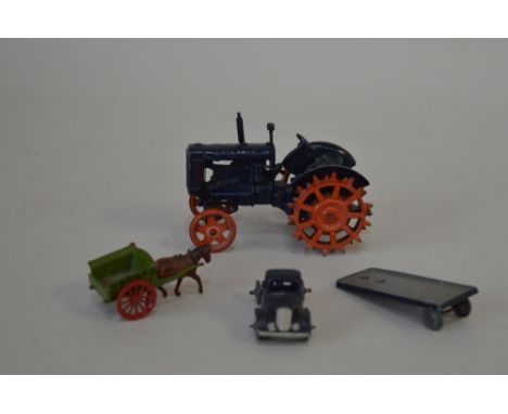 AN UNBOXED BRITAINS FORDSON MAJOR TRACTOR, No.127F, fitted with 'spud' wheels, missing driver, with an unboxed Britains Lilli