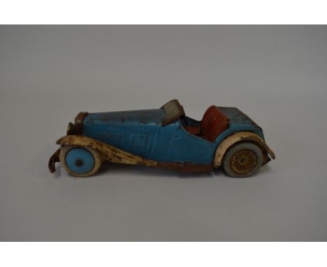 A MECCANO CLOCKWORK TWO SEATER SPORTS CAR, circa 1930's, non constructor version, blue body, white chassis and wings, red sea