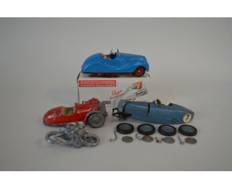 A BOXED MODERN REPRODUCTION SCHUCO EXAMICO 4001 CAR, complete with key and instructions, with an unboxed Gaiety Castle Art di