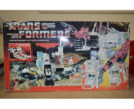 A BOXED HASBRO FIRST GENERATION TRANSFORMER AUTOBOT BATTLE STATION METROPLEX, complete except missing three missiles, with in