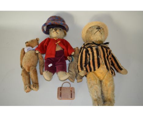 FOUR VINTAGE TEDDY BEARS, one approximately 54cm, jointed body, plastic eyes, vertical stitched nose, fur very worn on body, 