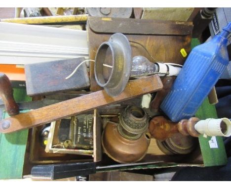 A box of assorted items to include tools, lamp base, etc