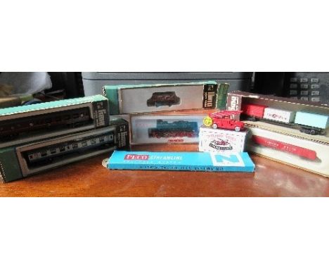 A cased Arnold train, model number 2214, together with other boxed train items to include Lima micro models, a Hornby Flying 