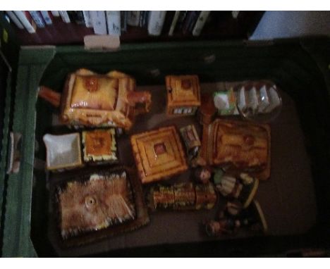 A box of china, to include novelty thatched cottage tea set, Goebel style figures, etc.