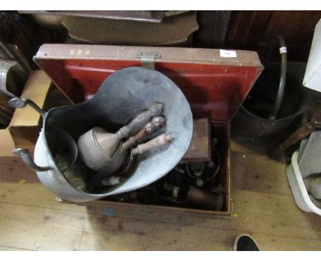 A tin trunk and contents, including sconces, handles etc.
