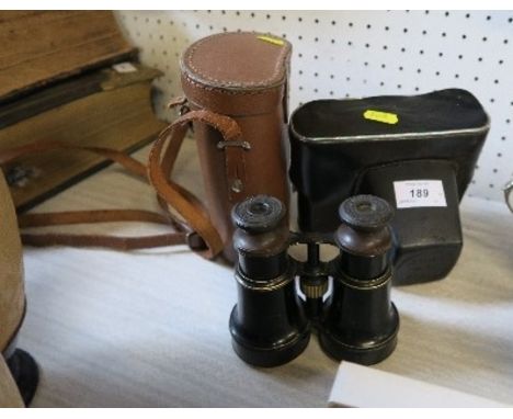 A pair of Voigtlender &amp; Sohn binoculars, and a Zenit camera