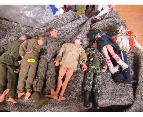 A collection of seven Action Man figures, to include one wearing a life jacket, another wearing a kilted uniform, the others 