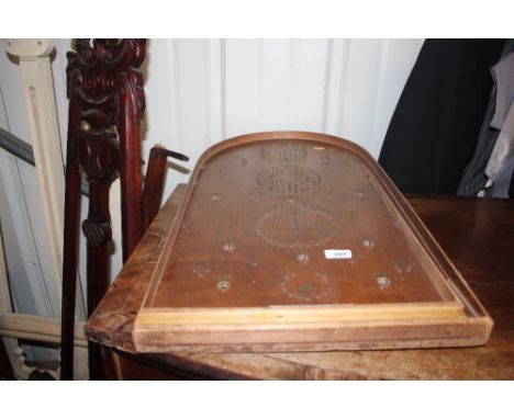 A Corinthian bagatelle board 