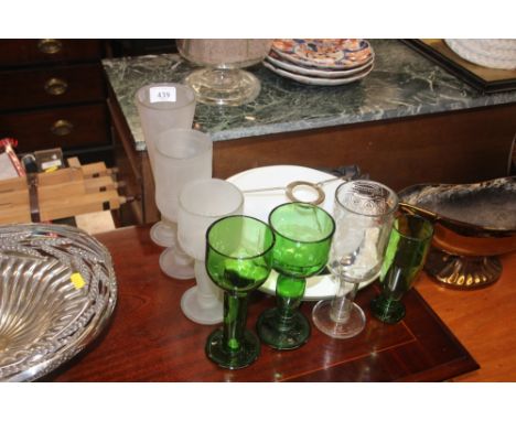 A quantity of various drinking glasses; and a light shade