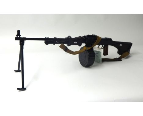 Deactivated; a Soviet RPD light machine gun, number 702160, calibre 7.62mm, with drum magazine and sling. Sold with certifica