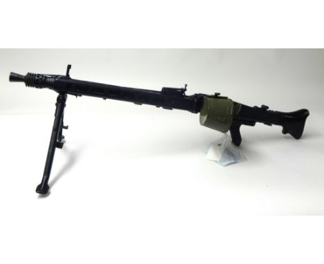 Deactivated; a Yugoslavian MG53/ MG 42 light machine gun, number N-41708, calibre 7.92mm, with tripod, belt and drum magazine