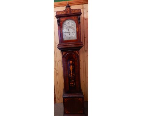 A mahogany and inlaid Bracket Clock, having silvered dial and three sub dials, with 8 day chiming movement, striking on a rac